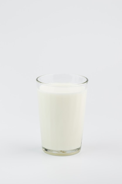 A glass of milk on a white background