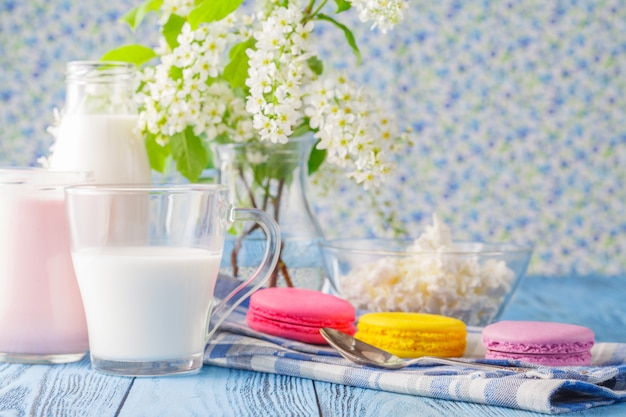 Glass of milk with french macaroon