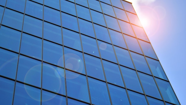 Glass modern building with blue sky background View and architecture details Urban abstract