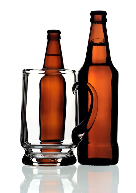 Glass mug and two bottles of beer isolated