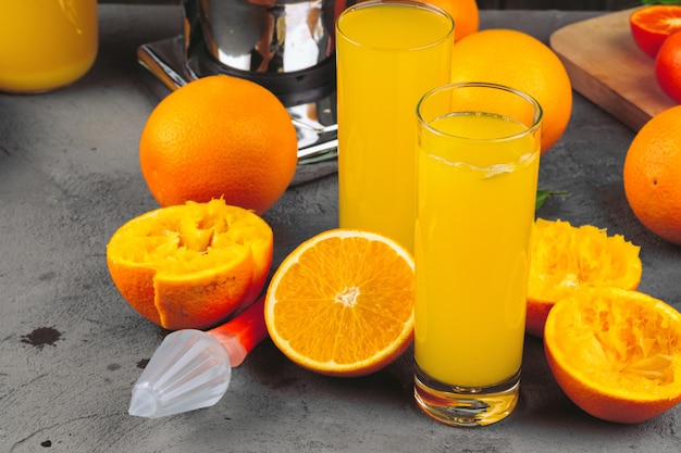 Glass of orange juice and orange slices