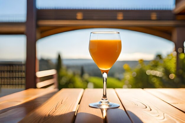 A glass of orange juice sits on a wooden table.