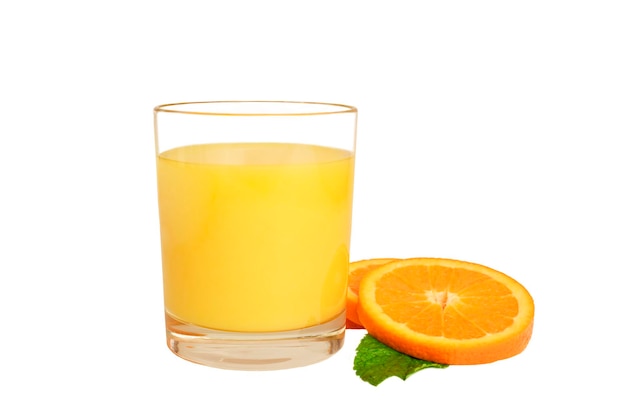 a glass of orange juice and a sliced orange on a white background