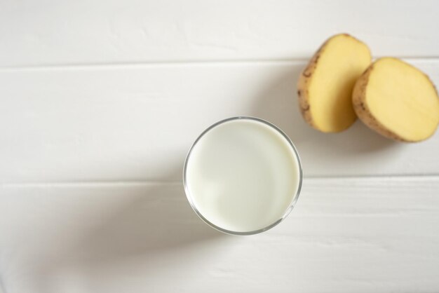 A glass of potato milk top view