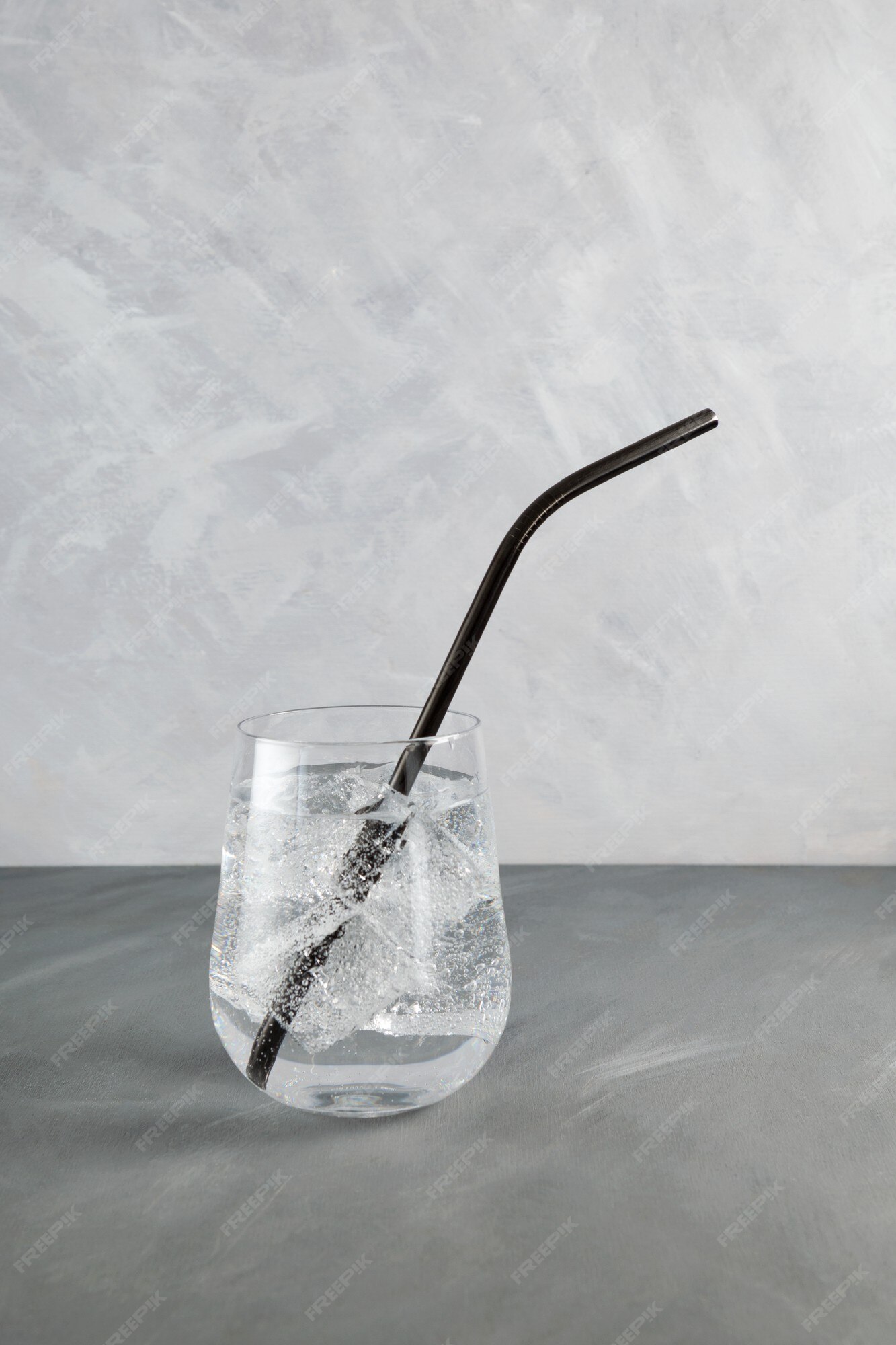 isolated glass of pure water with glass drinking straw. object