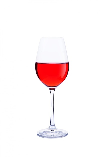 白で隔離されるガラスの赤ワイン。
