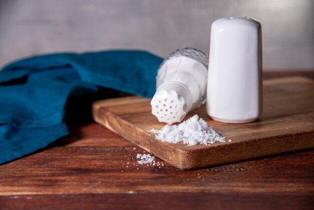 Glass salt shaker on the table