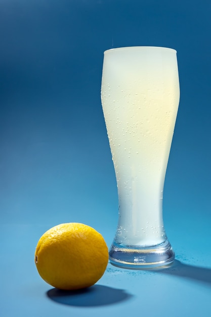 A glass of  seltzer  water with lemon