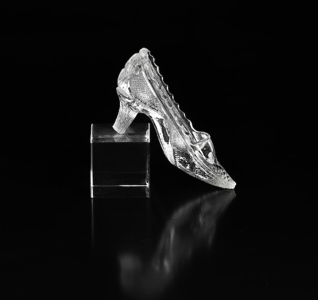 glass slipper isolated on black background