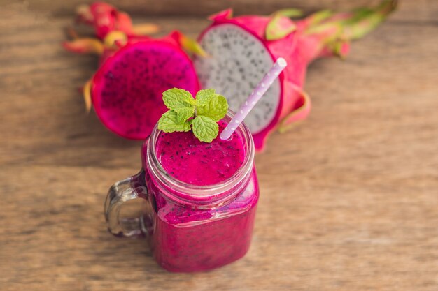 Glass of smoothie made from dragon fruit