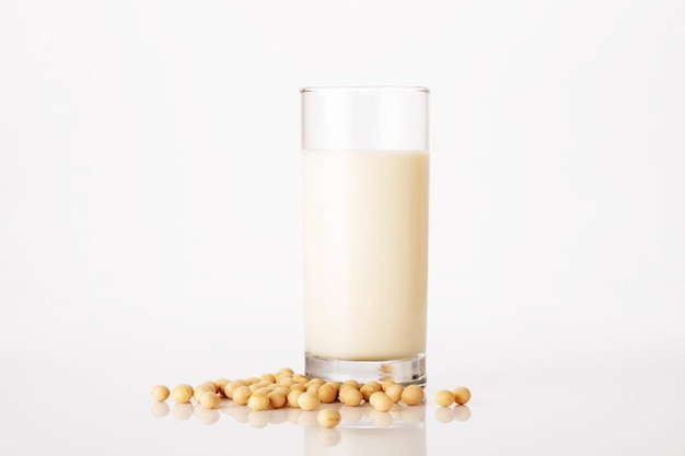 Glass of soya milk with soya beans