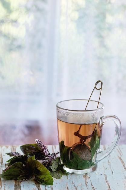 Photo glass of tea on table