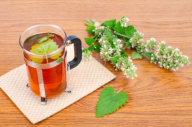 Glass of tea with flowers