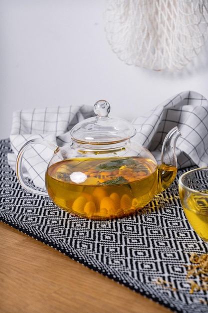 Glass teapot with tea