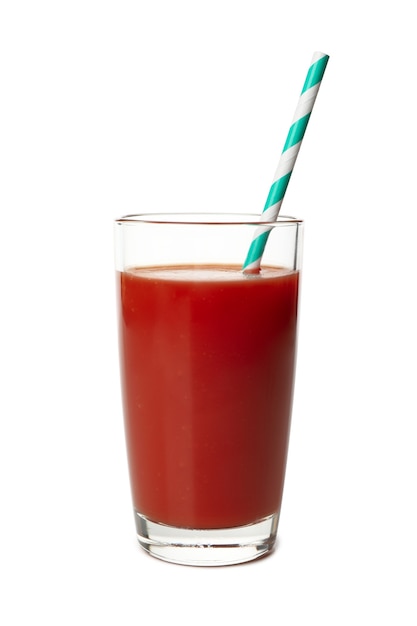 Glass of tomato juice isolated on white