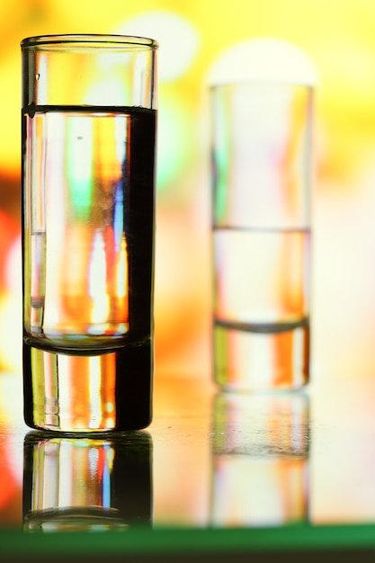 Glass of vodka on a bar counter