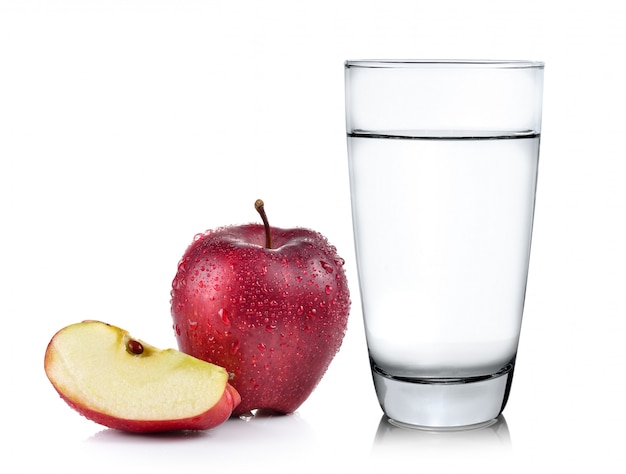 Photo glass of water and apple isolated