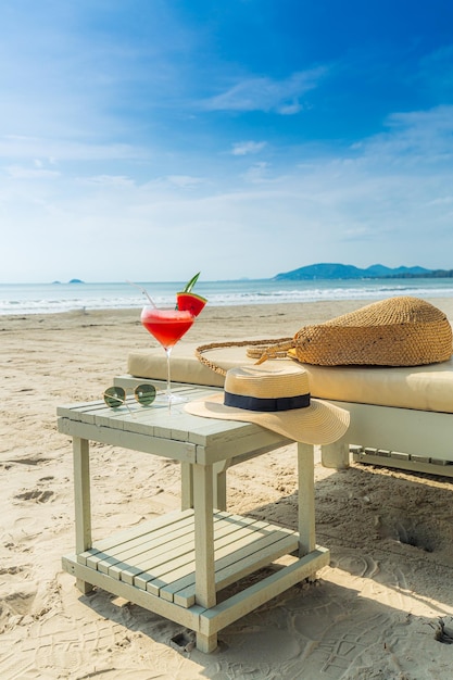 Photo a glass of watermelon juice on the table by the sea