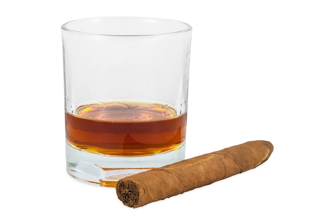 Glass of whiskey and cigar