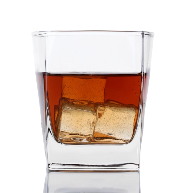 Glass of whiskey and ice isolated on white