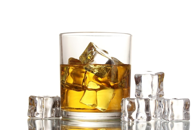 Glass of whiskey and ice isolated on white