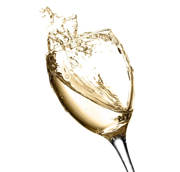 Photo glass of white splashing wine isolated on white