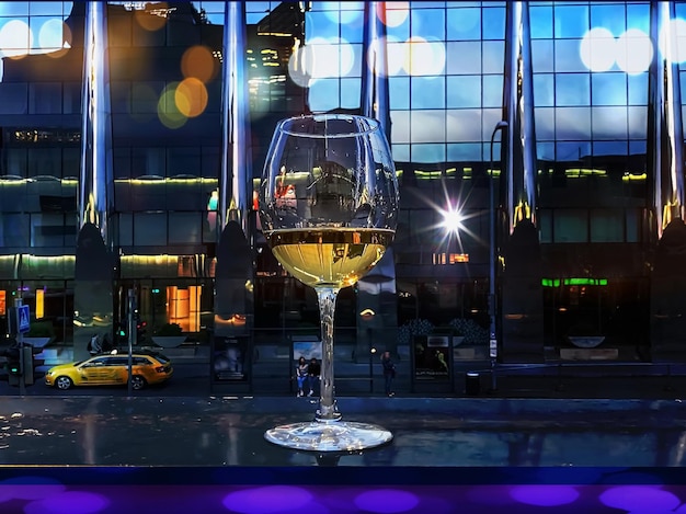 glass of wine and cup coffe in street cafe table in Tallinn old town