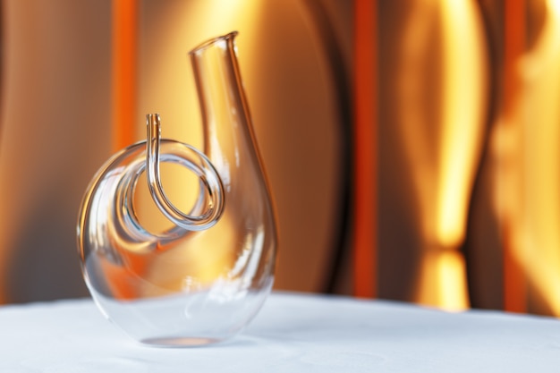 Photo glass of wine and a decanter on a table with a white tablecloth.