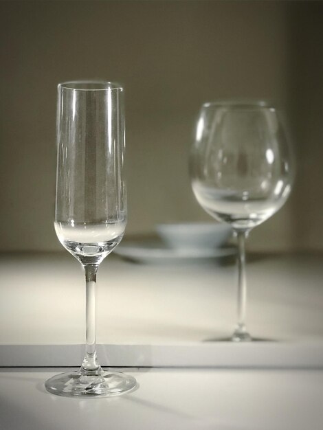 Glass of wine glasses on table