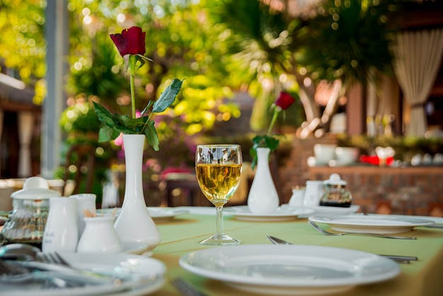 Glass of wine on served table. Restaurant.