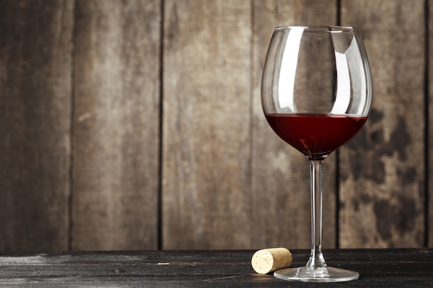 Glass of Wine on The Wooden Table