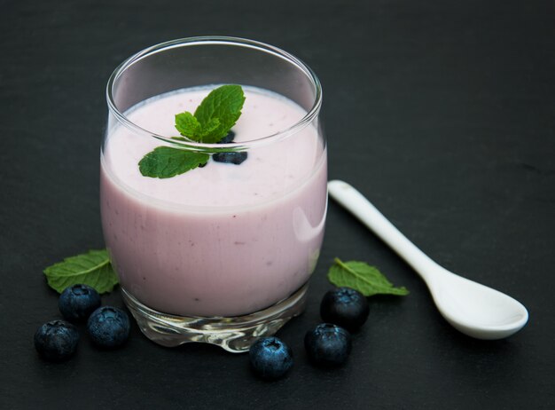 Glass with blueberry yogurt 