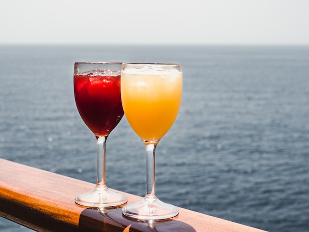 Glass with a cocktail and ice cubes