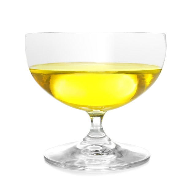 Glass with cooking oil on white background