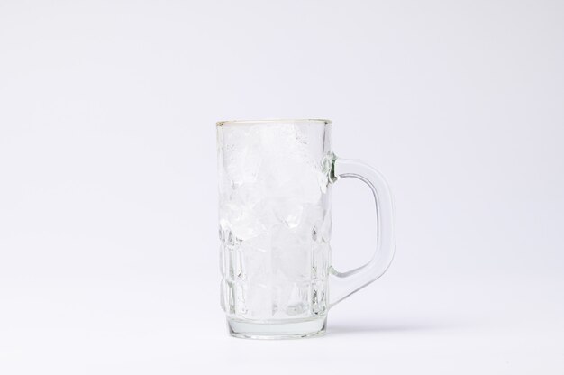 Photo glass with ice on a white background