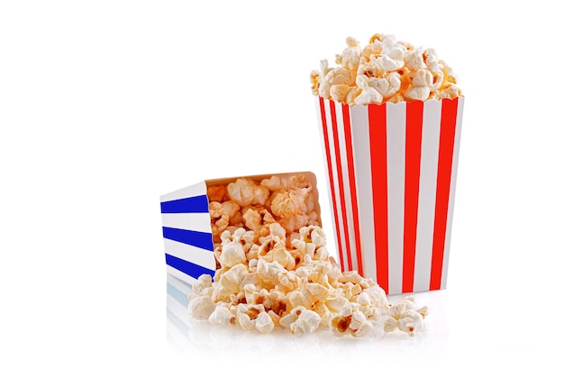 Glass with popcorn on a white background closeup