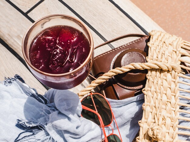 Glass with refresh wine and ice cubes