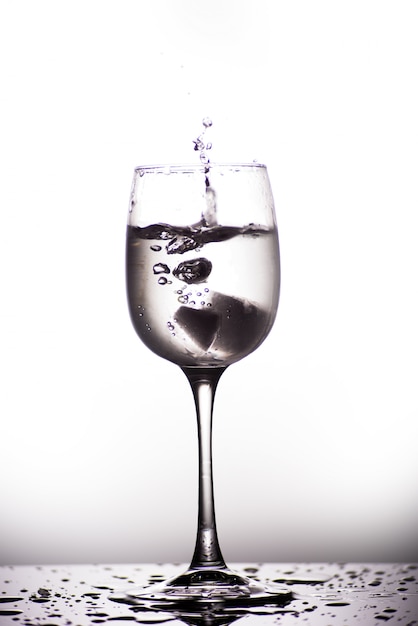 Glass with water isolated on a white