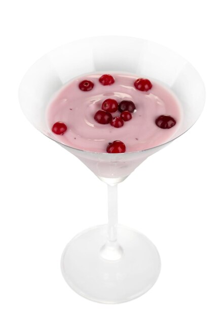 Glass of yoghurt dessert with berries isolated on white
