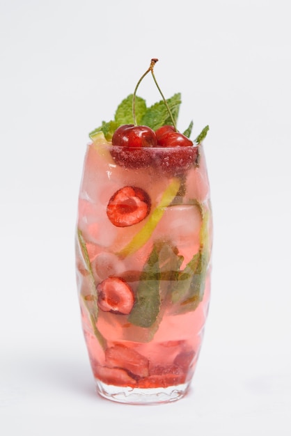 Glasse Of Drink With Ice Cubes And Fruits Isolated