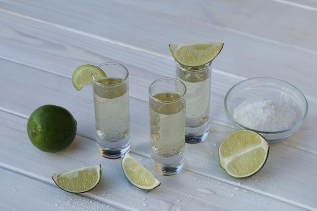 glasses of alcohol drink with lime and salt