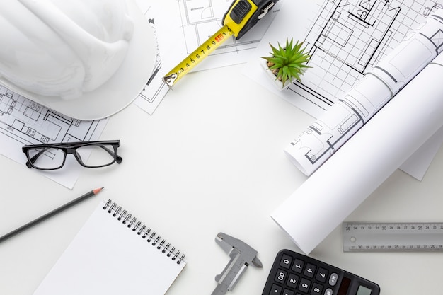 Photo glasses and blue print of a house