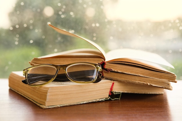 Glasses and books over the window