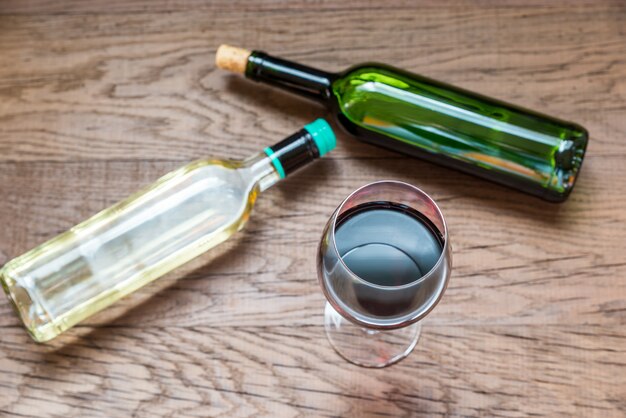 Glasses and bottles with red and white wine