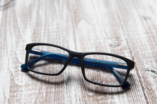 Glasses on bright wooden