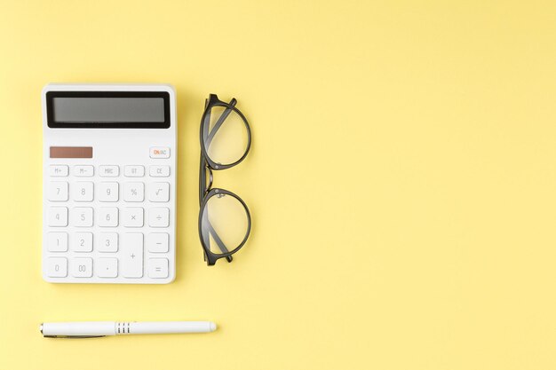 Glasses calculator and pen top view