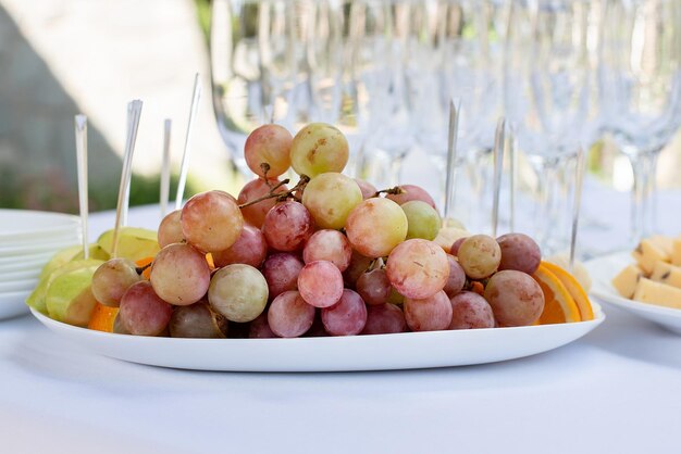 Glasses of champagne on the festive table serving for the wedding ceremony