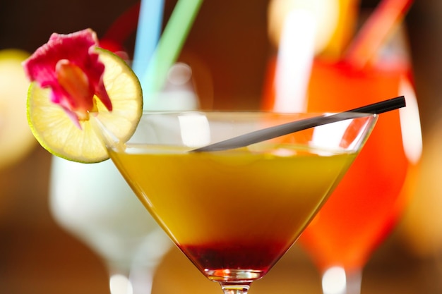 Glasses of cocktails on bar closeup