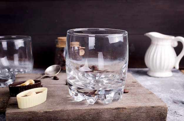 Glasses for coffee on an old wooden board grain coffee