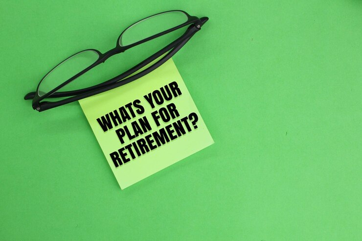 Photo glasses and colored paper with the question word whats your plan for retirement